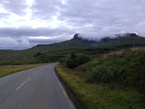 Cycling to Staffin, looking back at the old man of Storr under the mist